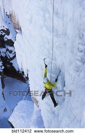 Caucasian climber scaling glacier View Large Photo Image Stock Image - Caucasian climber scaling glacier. Fotosearch