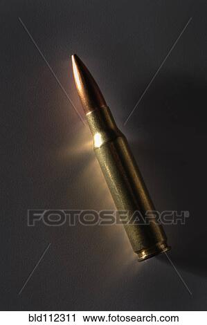 Stock Image - Close up of bullet. Fotosearch
