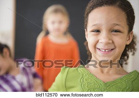 Close up of girl's smiling face View Large Photo Image Stock Image - Close up of girl's smiling face. Fotosearch