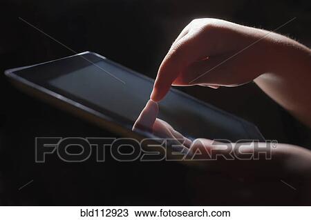 Close up of Hispanic girl using tablet computer View Large Photo Image Stock Image - Close up of Hispanic girl using tablet computer. Fotosearch