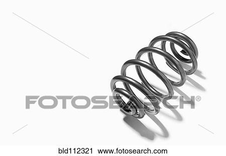 Stock Image - Close up of metal spring. Fotosearch