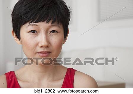 Stock Image - Close up of woman's face. Fotosearch