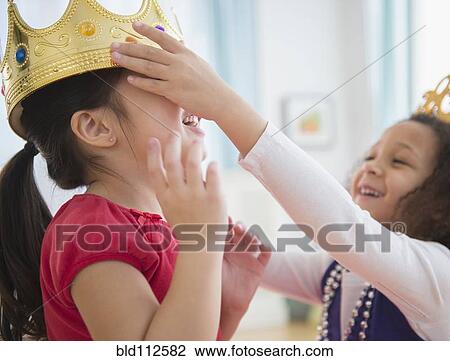 Girls playing dress up together View Large Photo Image Stock Image - Girls playing dress up together. Fotosearch