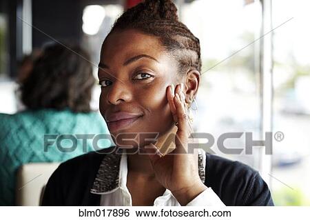 Black businesswoman smiling View Large Photo Image Stock Photograph - Black businesswoman smiling. Fotosearch