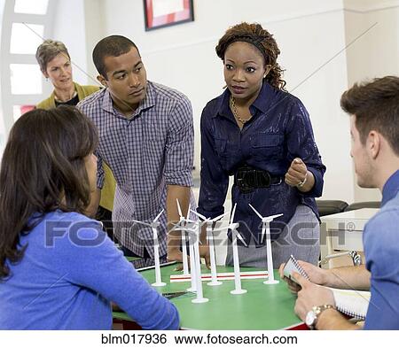 Business people talking in meeting View Large Photo Image Stock Photograph - Business people talking in meeting. Fotosearch