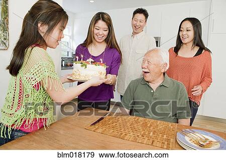 Japanese family celebrating birthday together View Large Photo Image Stock Photo - Japanese family celebrating birthday together. Fotosearch