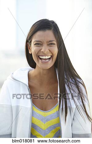 Mixed race woman laughing View Large Photo Image Stock Image - Mixed race woman laughing. Fotosearch