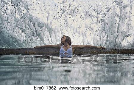 Pacific Islander woman relaxing in pool View Large Photo Image Stock Image - Pacific Islander woman relaxing in pool. Fotosearch