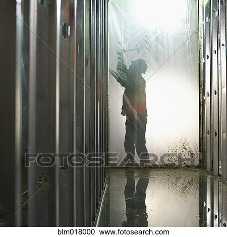 Silhouette of worker cleaning sheet View Large Photo Image Stock Image - Silhouette of worker cleaning sheet. Fotosearch