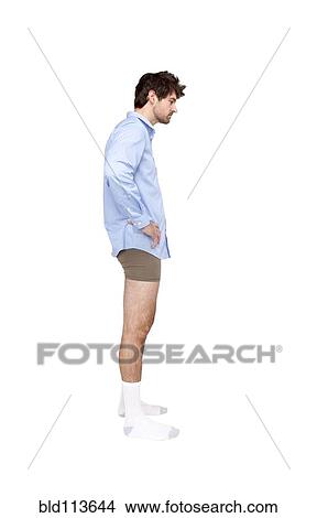 Picture - Caucasian businessman wearing shirt, socks and underwear. Fotosearch