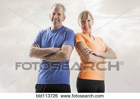 Caucasian couple smiling together View Large Photo Image Stock Photograph - Caucasian couple smiling together. Fotosearch