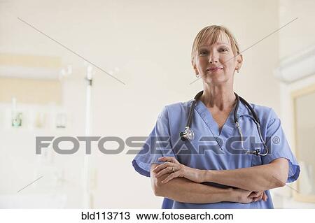 Caucasian nurse smiling View Large Photo Image Stock Image - Caucasian nurse smiling. Fotosearch
