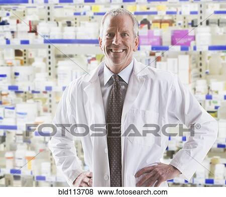 Stock Photo - Caucasian pharmacist smiling. Fotosearch