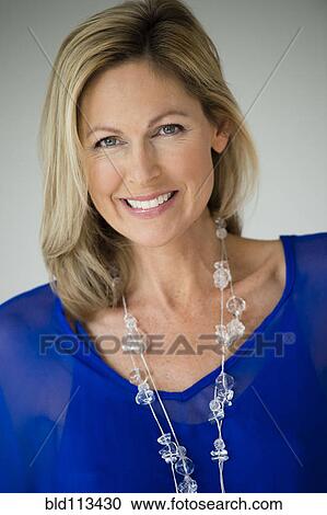 Stock Image - Caucasian woman smiling. Fotosearch