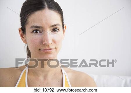 Stock Image - Caucasian woman smiling. Fotosearch