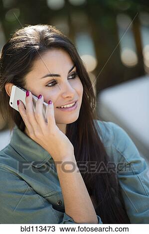 Caucasian woman talking on cell phone View Large Photo Image Stock Image - Caucasian woman talking on cell phone. Fotosearch