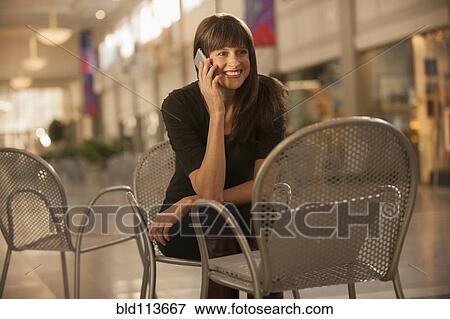 Caucasian woman talking on cell phone View Large Photo Image Stock Photo - Caucasian woman talking on cell phone. Fotosearch