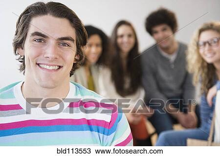 Stock Image - Close up of man's smiling face. Fotosearch