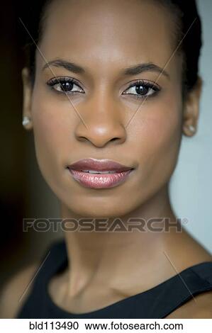 Stock Image - Close up of woman's face. Fotosearch