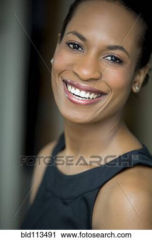 Close up of woman's smiling face View Large Photo Image Stock Image - Close up of woman's smiling face. Fotosearch
