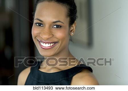 Close up of woman's smiling face View Large Photo Image Stock Image - Close up of woman's smiling face. Fotosearch