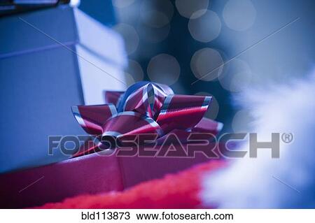 Stock Image - Close up of wrapped Christmas gift. Fotosearch