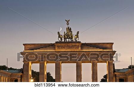 Picture - Columned building and statue lit up at night, Berlin, Germany. Fotosearch