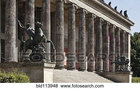 Stock Photo - Columned building with ornate statues, Berlin, Germany. Fotosearch