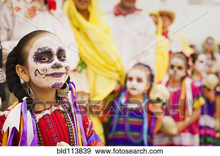 Stock Photo - Hispanic children celebrating Dia de los Muertos. Fotosearch