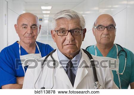 Hispanic doctor, surgeon and nurse in hospital View Large Photo Image Stock Photo - Hispanic doctor, surgeon and nurse in hospital. Fotosearch