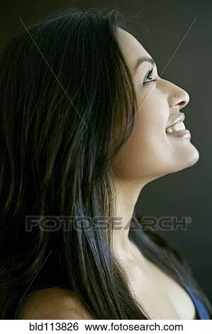 Stock Photograph - Indian woman smiling. Fotosearch