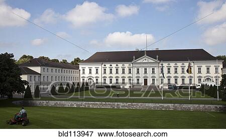 Stock Photo - Ornate building and green lawn, Berlin, Germany. Fotosearch