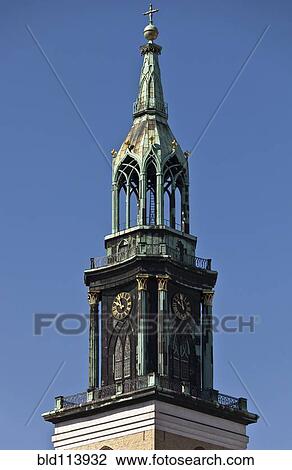 Ornate clock tower and blue sky, Berlin, Germany View Large Photo Image Stock Image - Ornate clock tower and blue sky, Berlin, Germany. Fotosearch