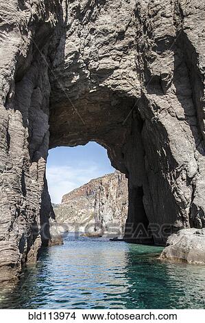 Rock formation in ocean, Isle of Lipari, Sicily, Italy View Large Photo Image Picture - Rock formation in ocean, Isle of Lipari, Sicily, Italy. Fotosearch
