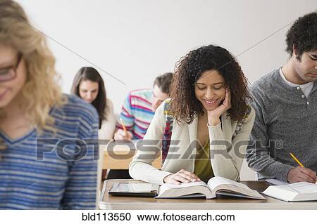 Stock Image - Students working in class. Fotosearch