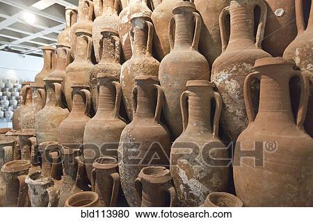 Unfinished clay pots in studio View Large Photo Image Stock Image - Unfinished clay pots in studio. Fotosearch