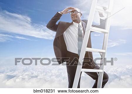 African American businessman climbing ladder View Large Photo Image Stock Image - African American businessman climbing ladder. Fotosearch