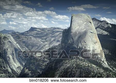 Stock Photograph - Boulder overlooking Yosemite, California, United States. Fotosearch