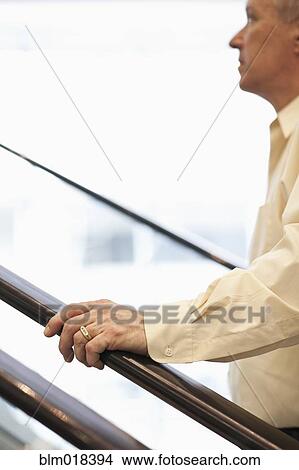 Caucasian businessman climbing steps View Large Photo Image Picture - Caucasian businessman climbing steps. Fotosearch