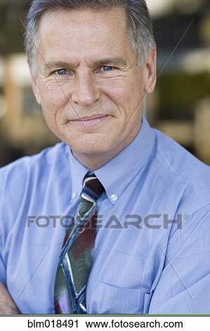 Caucasian businessman smiling View Large Photo Image Stock Image - Caucasian businessman smiling. Fotosearch