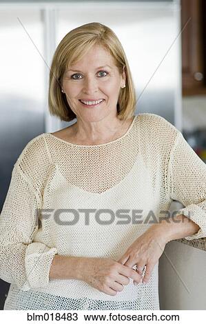 Stock Image - Caucasian woman smiling. Fotosearch