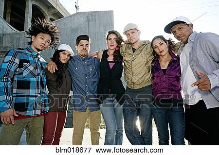 Friends posing under overpass View Large Photo Image Stock Photo - Friends posing under overpass. Fotosearch