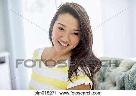 Stock Image - Japanese woman smiling. Fotosearch