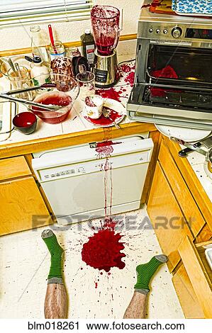 Man laying on floor in messy kitchen View Large Photo Image Stock Image - Man laying on floor in messy kitchen. Fotosearch