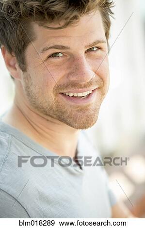 Stock Photo - Man smiling. Fotosearch
