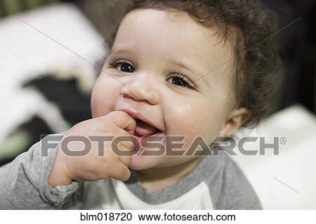 Mixed race baby smiling View Large Photo Image Stock Image - Mixed race baby smiling. Fotosearch