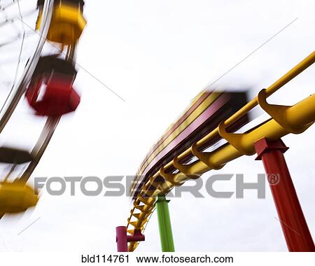 Blurred view of roller coaster ride View Large Photo Image Stock Image - Blurred view of roller coaster ride. Fotosearch