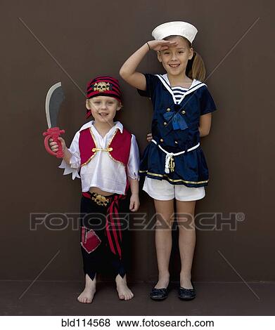 Stock Photo - Caucasian children playing dress up. Fotosearch