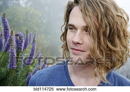 Caucasian man standing outdoors View Large Photo Image Stock Photography - Caucasian man standing outdoors. Fotosearch