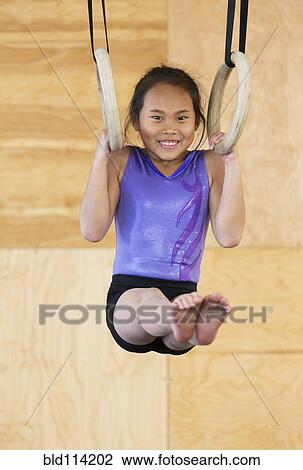 Chinese girl practicing gymnastics View Large Photo Image Stock Image - Chinese girl practicing gymnastics. Fotosearch